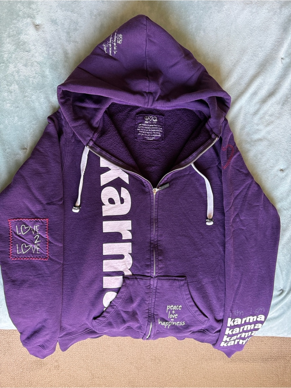 Peace Love World Purple Zip-Up Hoodie with 'Karma' Graphic